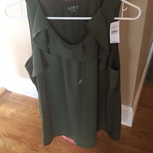 Loft top Front is polyester and back is cotton.